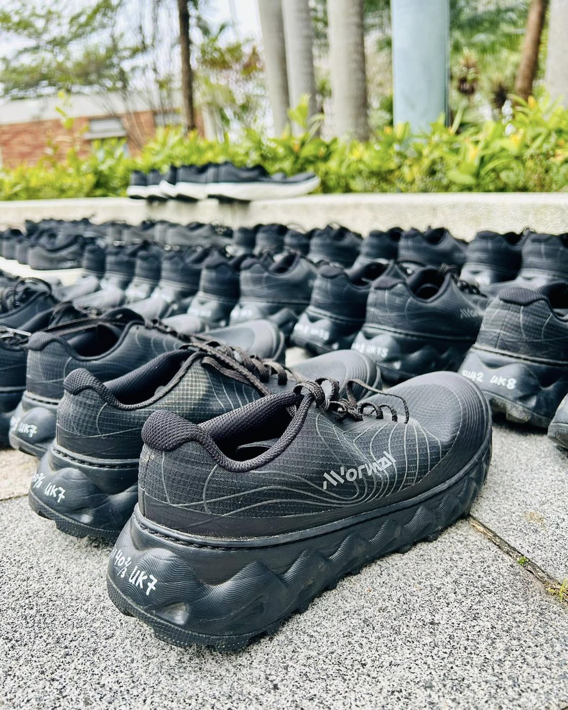 Rows of NNormal test shoes lined up for a try-out session